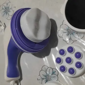 Foto de cliente do massageador com disco ondulado